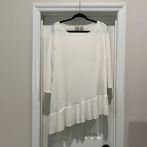Chicos travelers creamy white 3/4 sleeve tunic with ruffle trim on a bias. Size3